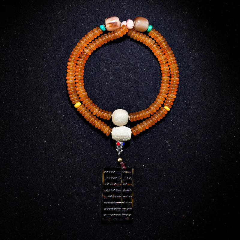 8. Natural Shofar 108 Buddha Blood Beads Mala Bracelet - Cosmic Serenity Shop