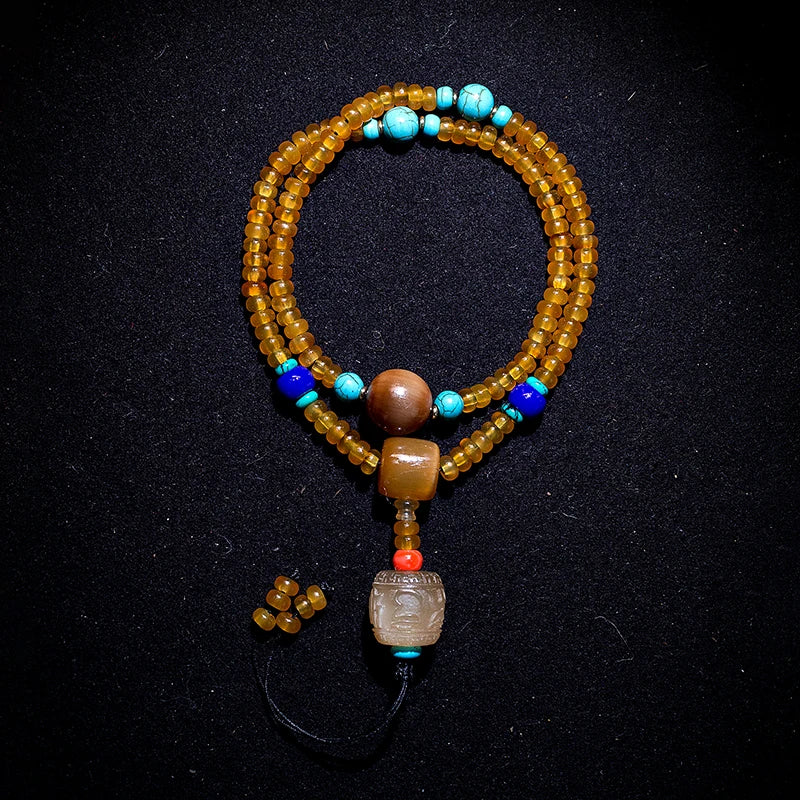 4. Natural Shofar 108 Buddha Blood Beads Mala Bracelet - Cosmic Serenity Shop