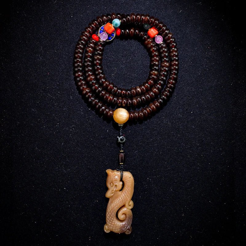6. Natural Shofar 108 Buddha Blood Beads Mala Bracelet - Cosmic Serenity Shop